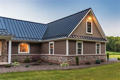 house with brown siding and tan metal roof|7 Best Metal Roof and Siding Color Combinations.